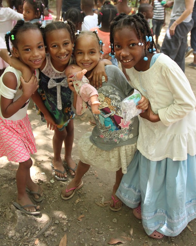 4 girls and a baby doll